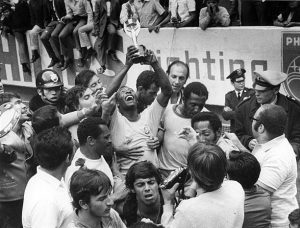 (GERMANY OUT) 1970 FIFA World Cup in Mexico Pele (Edson Arantes do Nascimento) 1940 - Brazilian football player, 1994 Minister of Sports in Brazil - Celebrating Pele, surrounded by teammates, is raising the Jues Rimet Trophy after beating Italy in the final - June 1970 (Photo by Horstmüller/ullstein bild via Getty Images)